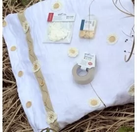 IDEES CREATIVES : Tuto - Réalisez un coussin fleurs au crochet